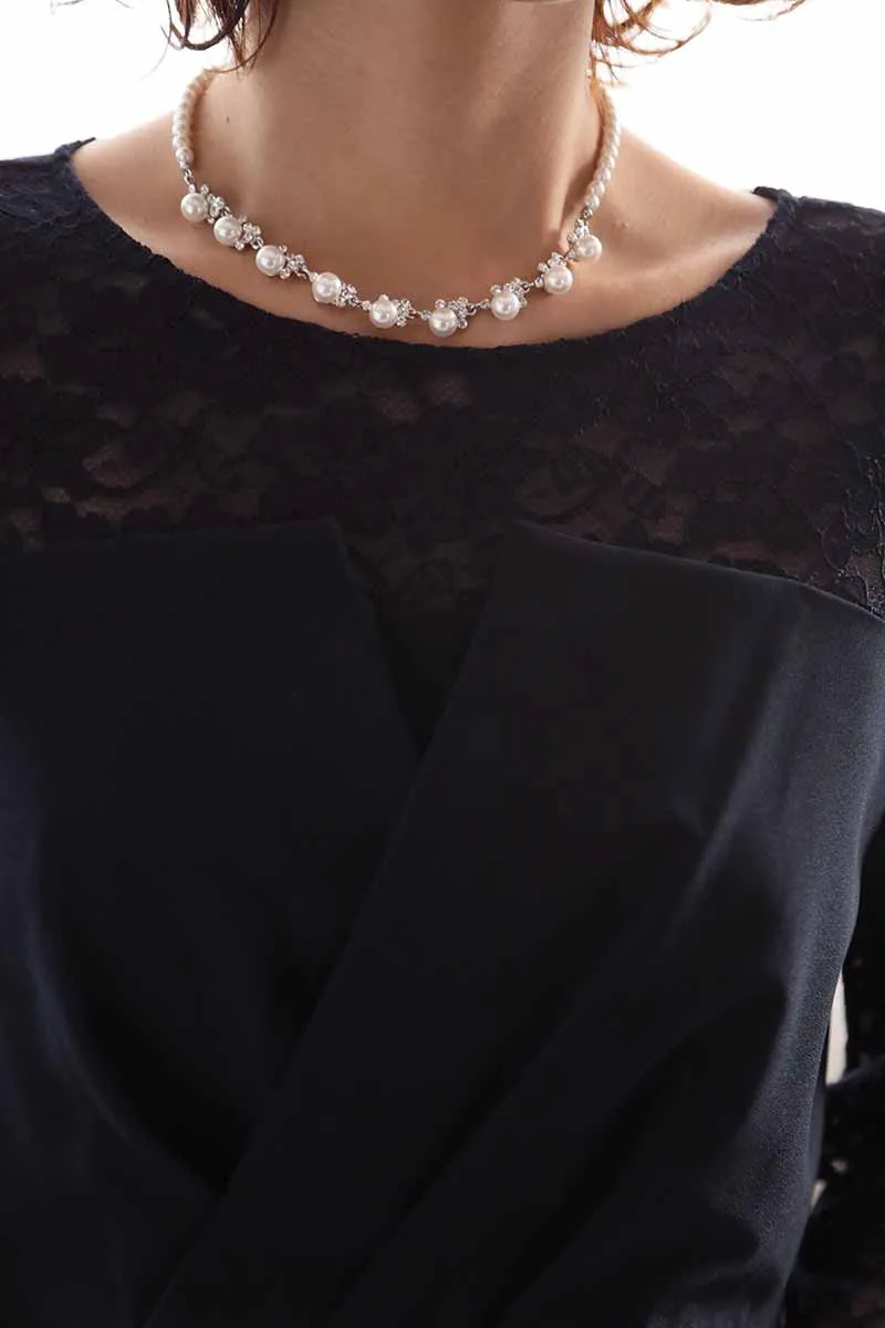 ネイビーの七分袖レースビスチェデザインドレス