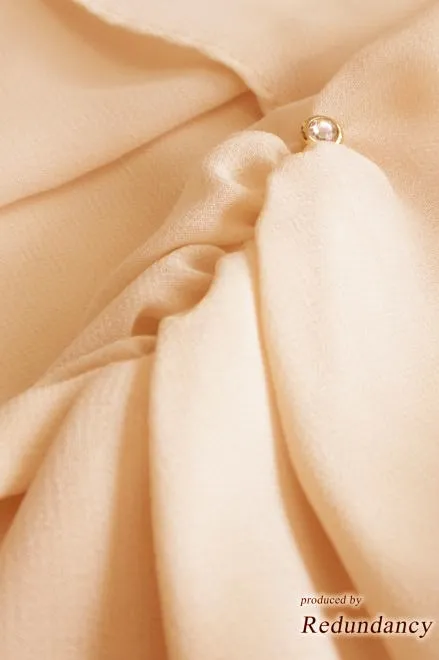 ベージュのシンプル七分袖ボレロ