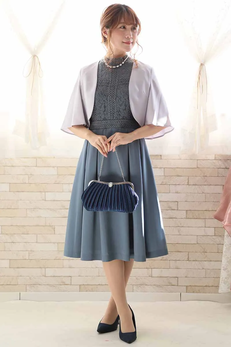 ネイビーのストーンボタンバッグ