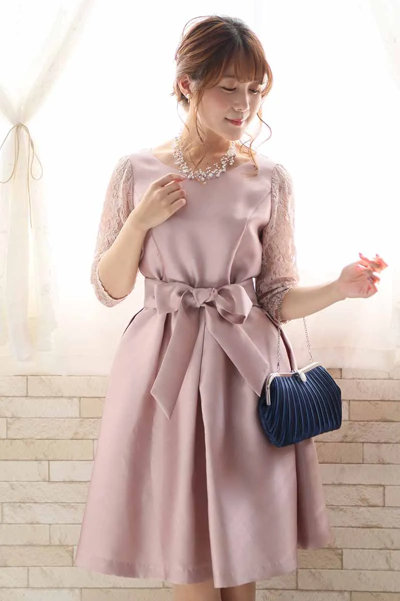 ネイビーのストーンボタンバッグ