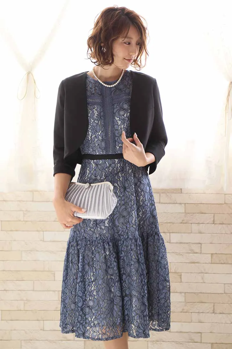 シルバーのストーンボタンバッグ