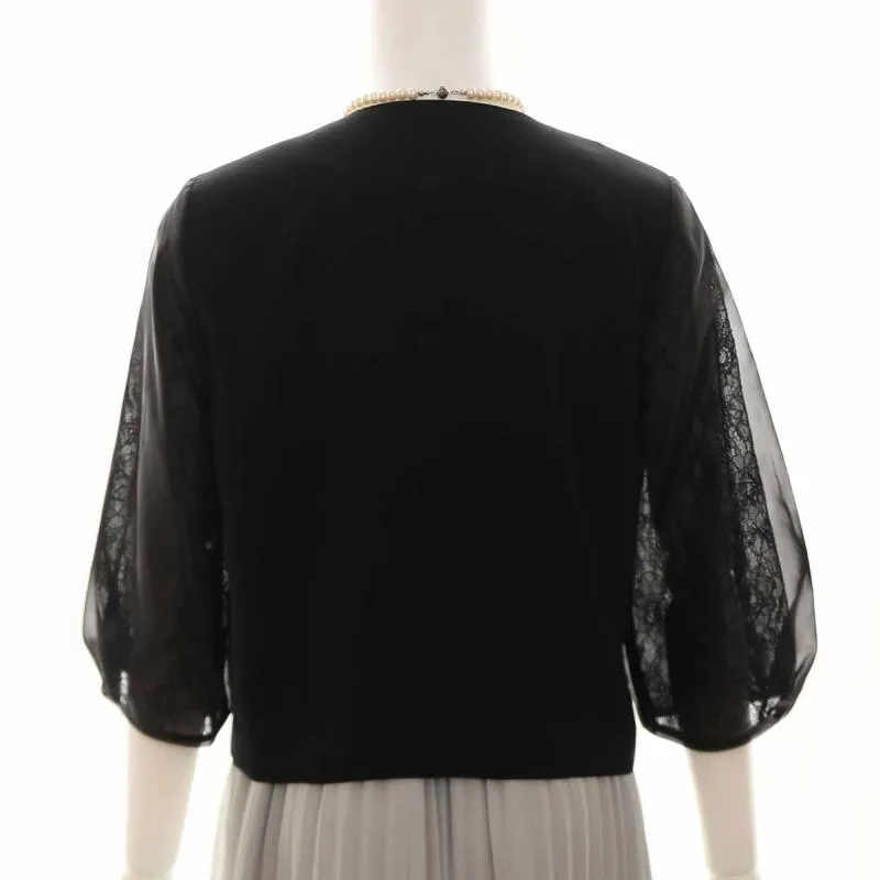 ブラックのボリューム袖ボレロ