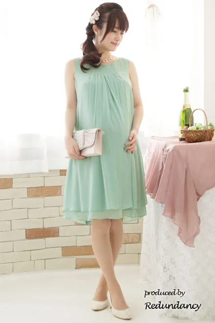 パステルグリーンのバックフリルシフォンドレス