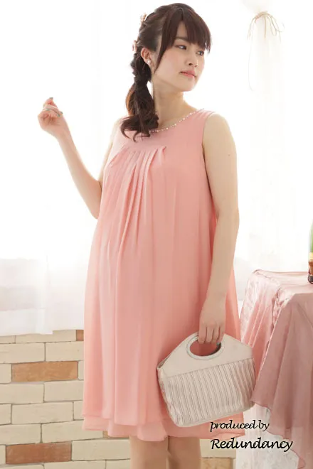 ピンクのバックフリルシフォンドレス