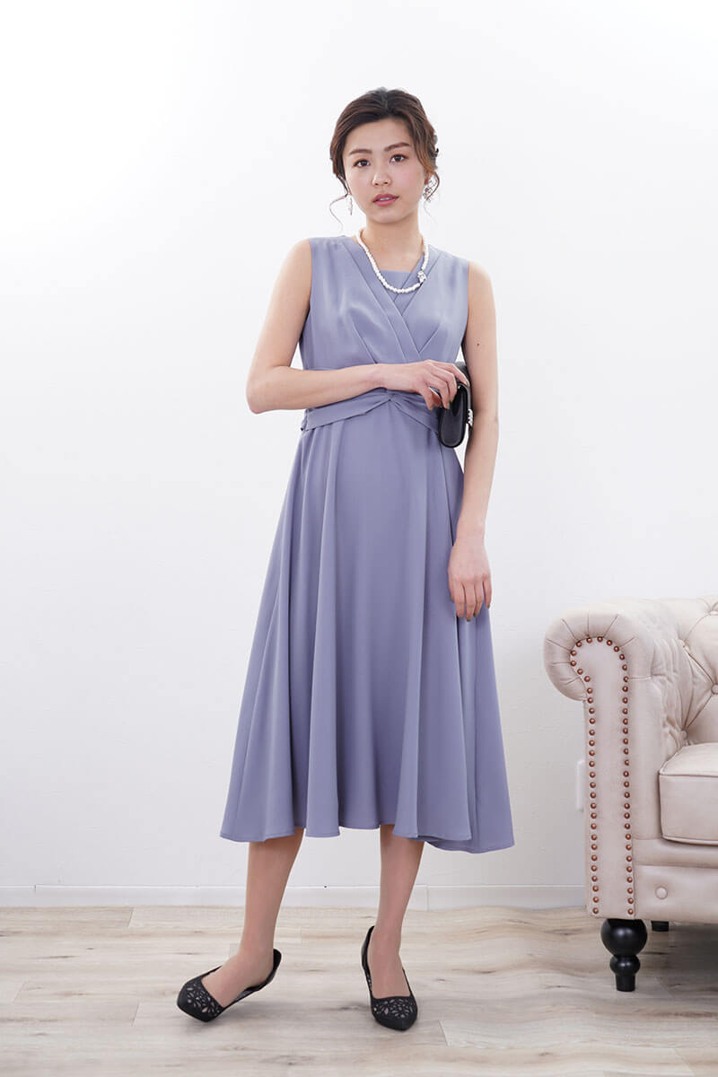 ブルーのウエストモチーフカシュクールドレス