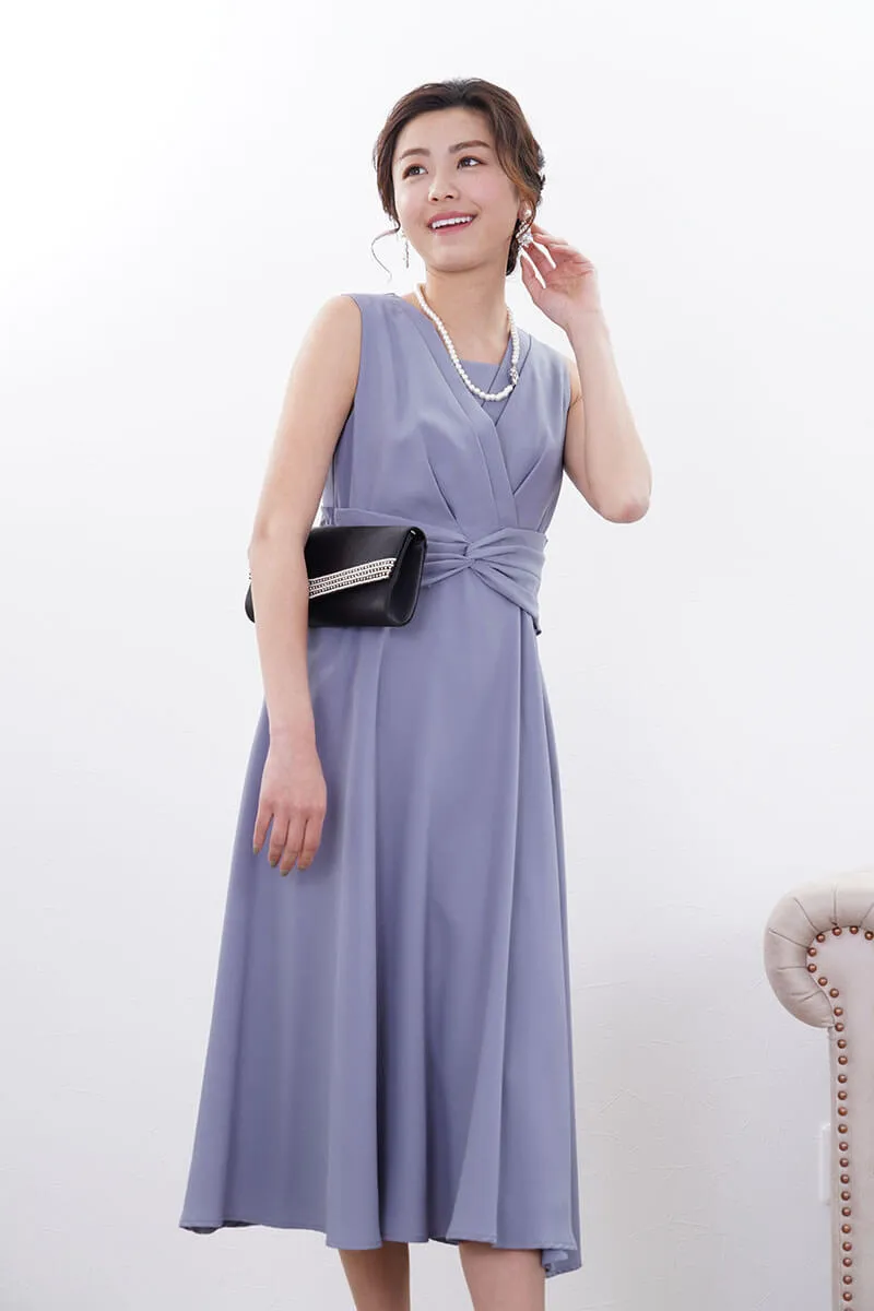 ブルーのウエストモチーフカシュクールドレス