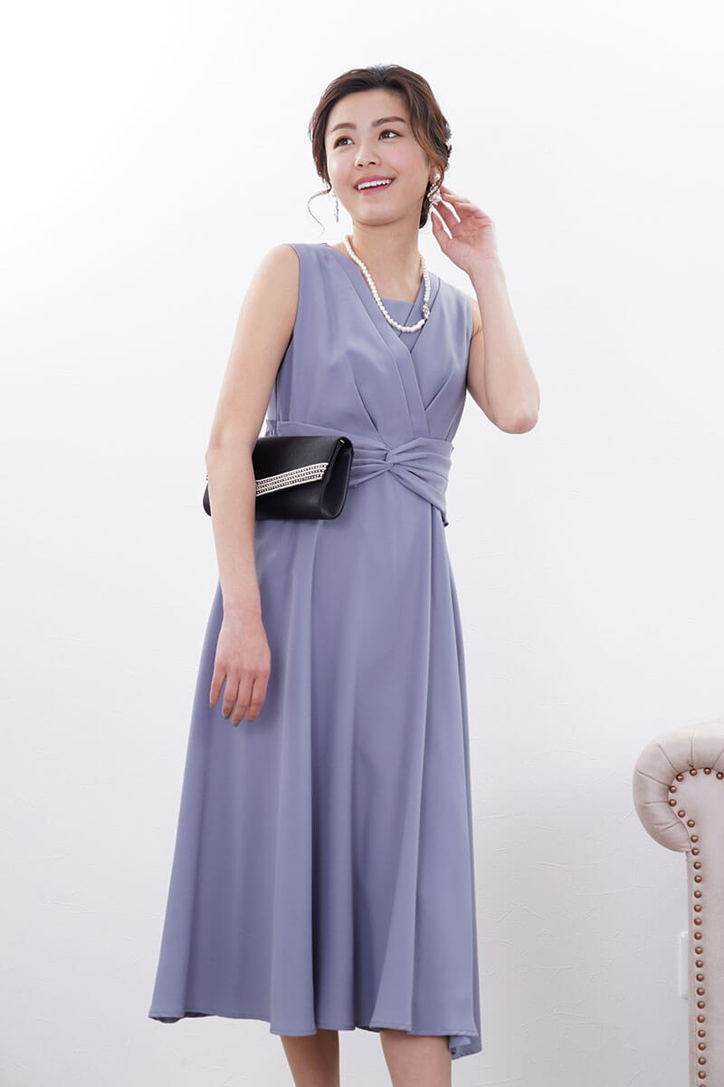 ブルーのウエストモチーフカシュクールドレス