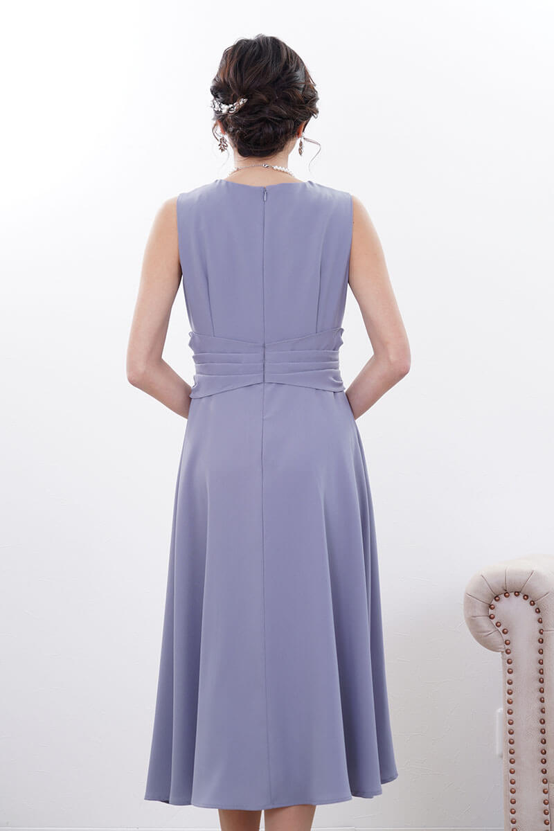 ブルーのウエストモチーフカシュクールドレス