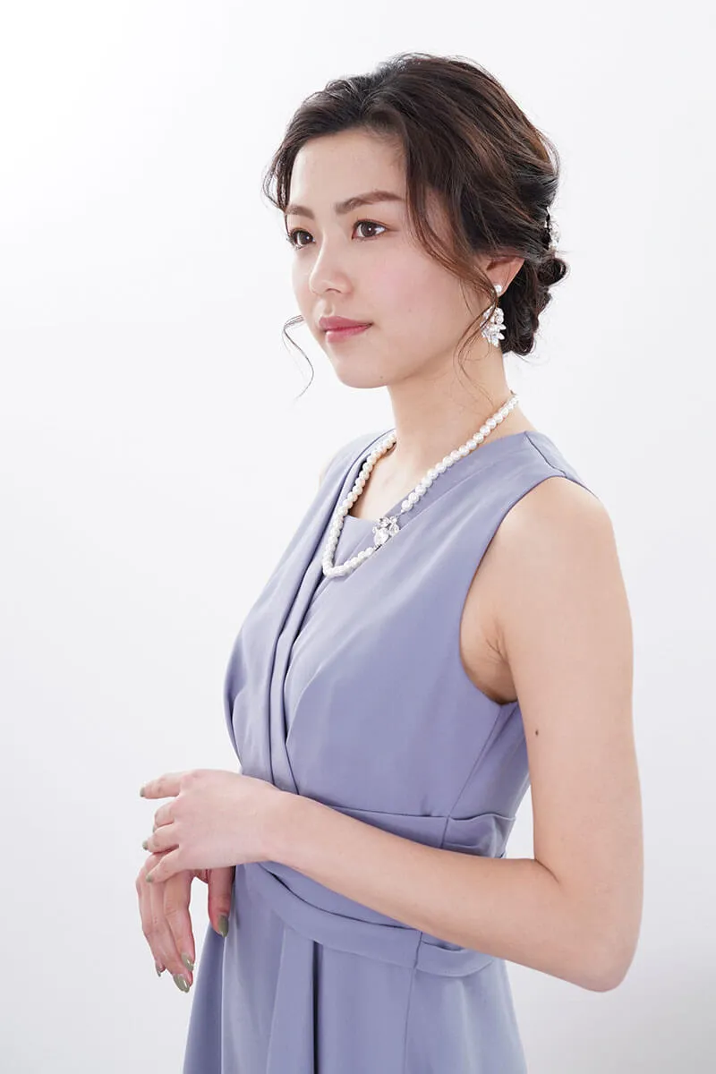 ブルーのウエストモチーフカシュクールドレス