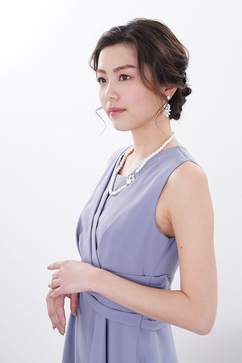 ブルーのウエストモチーフカシュクールドレス