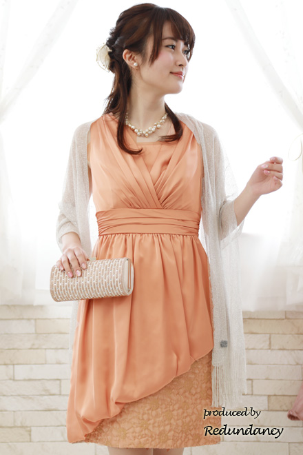オレンジピンクのアシンメトリー切替タイトドレス