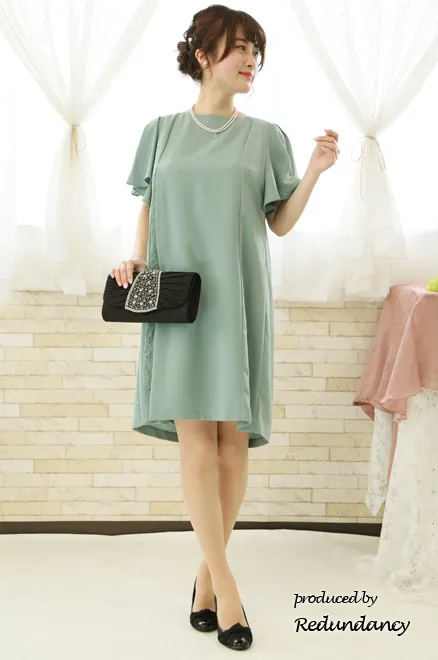 ライトグリーンのレース切替バックリボンドレス