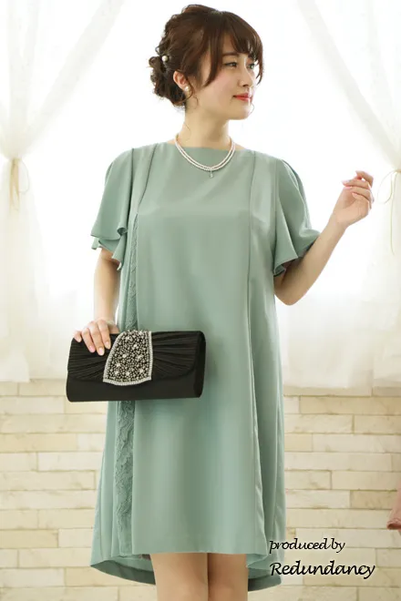 ライトグリーンのレース切替バックリボンドレス