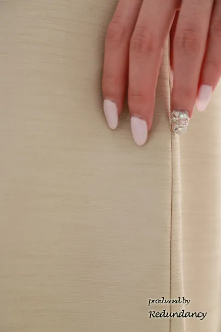 ベージュのウエスト変形リボンドレス