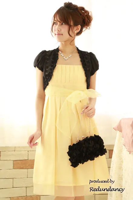 レモンイエローの透け感リボン膝丈ドレス
