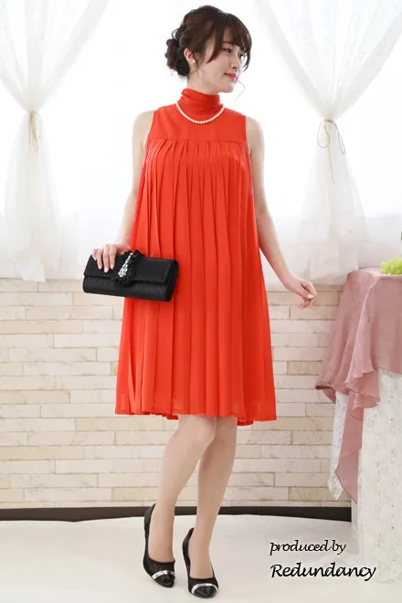 オレンジのAラインプリーツドレス