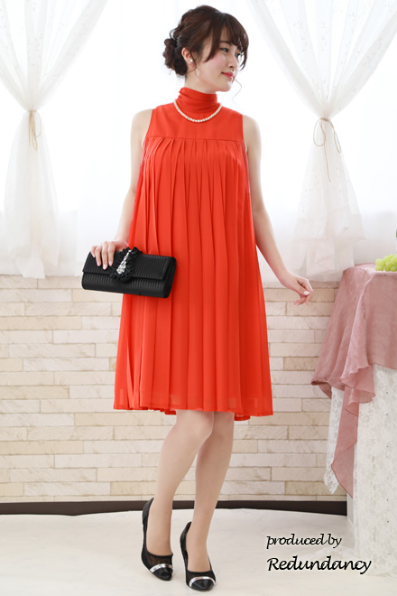 オレンジのAラインプリーツドレス