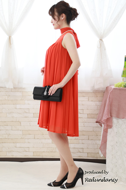 オレンジのAラインプリーツドレス
