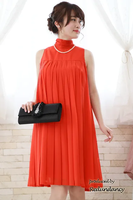 オレンジのAラインプリーツドレス