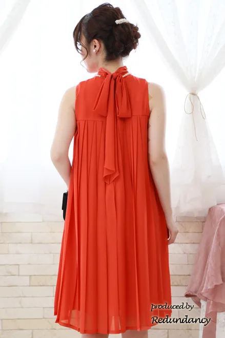 オレンジのAラインプリーツドレス