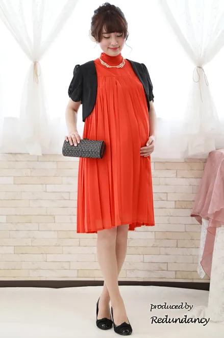オレンジのAラインプリーツドレス