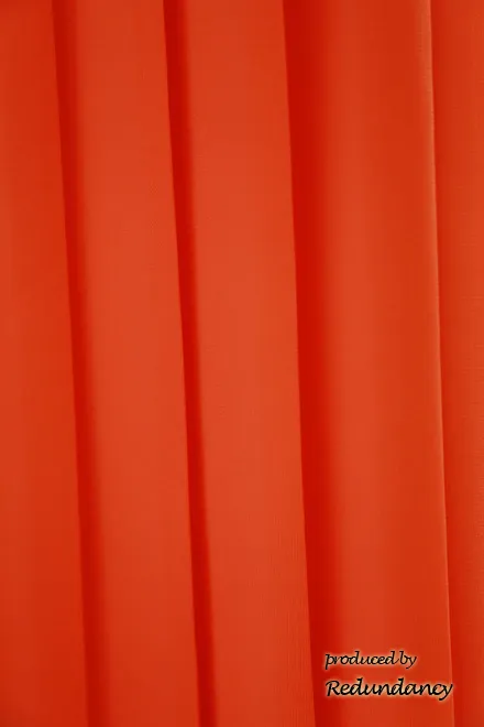 オレンジのAラインプリーツドレス