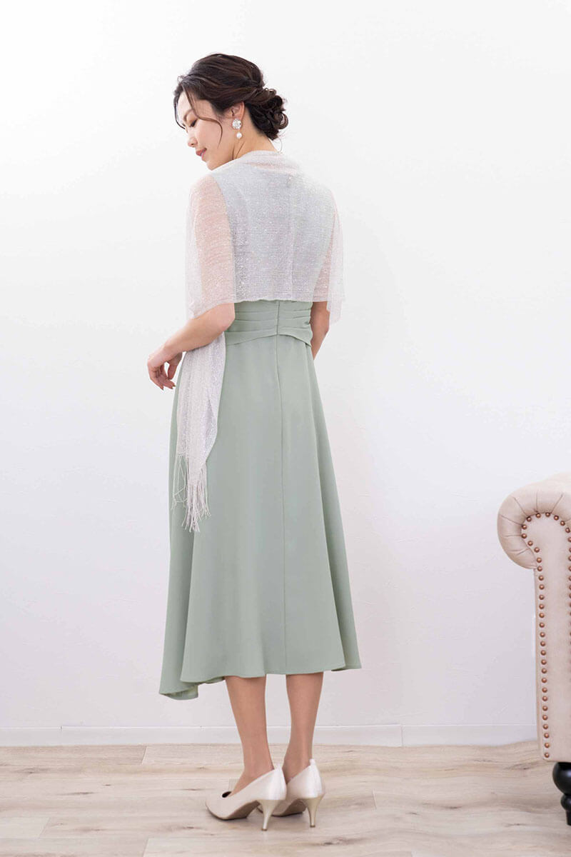 ライトグリーンのウエストモチーフカシュクールドレス