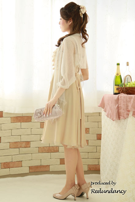 ベージュのビジュー付き背中編み上げフリルドレス