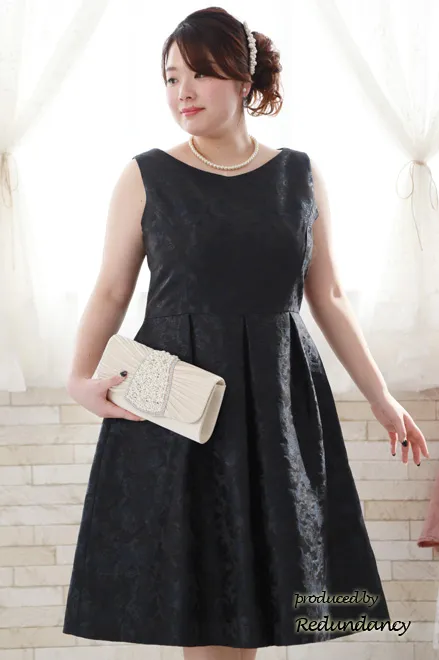 ネイビーの花柄タック入りノースリーブドレス