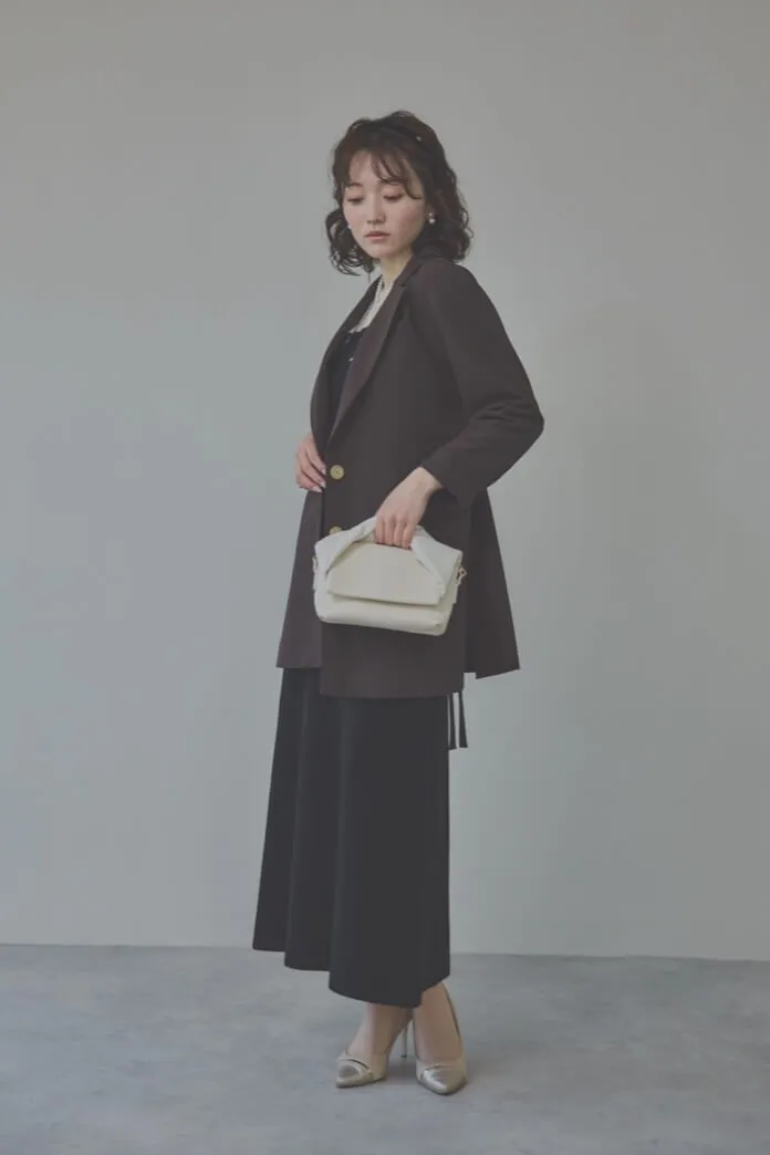 アイボリーのリュバンバッグ