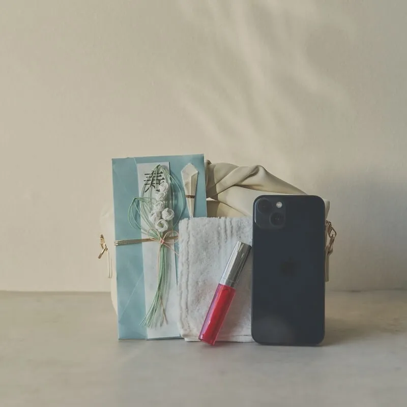 アイボリーのリュバンバッグ