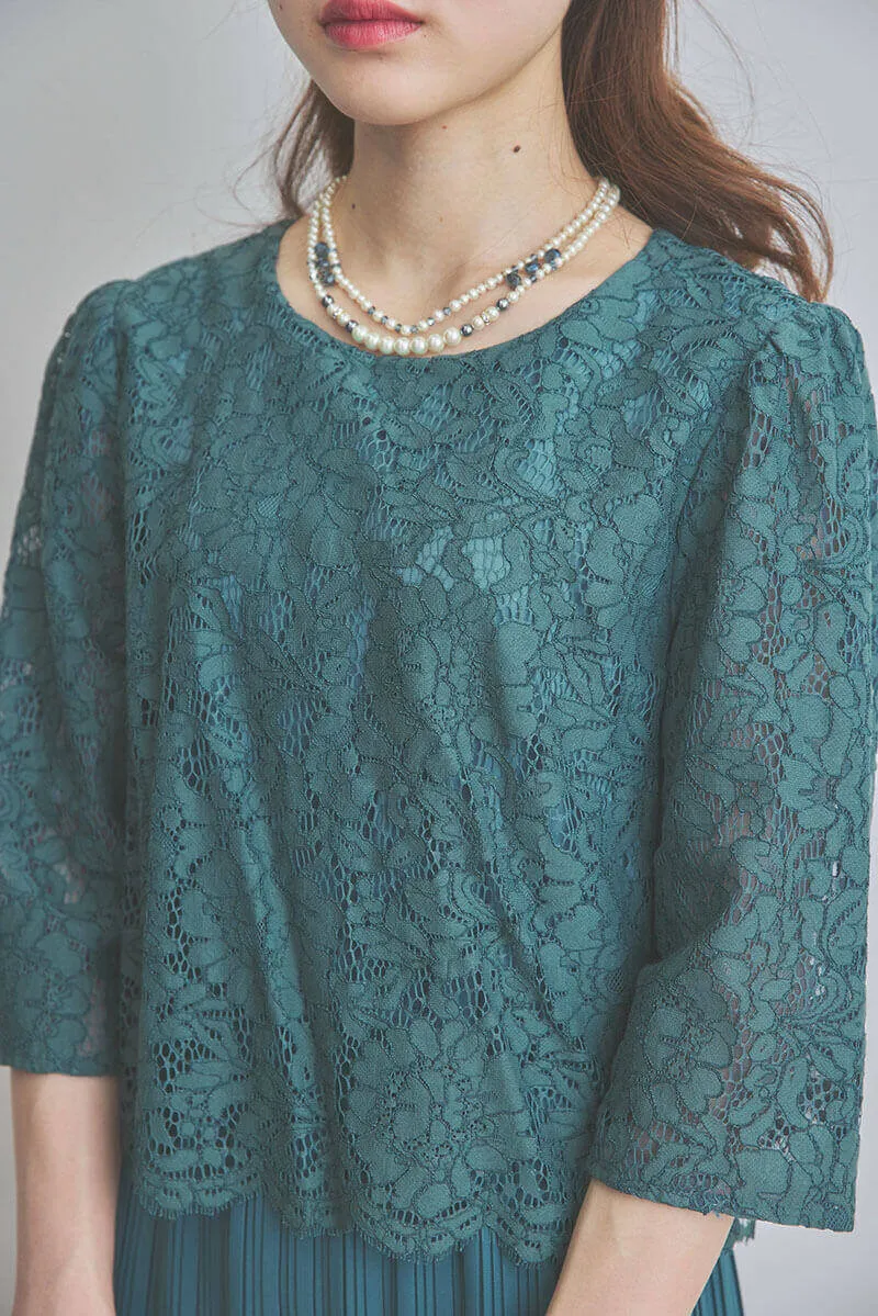 グリーンのレースコンビプリーツドレス