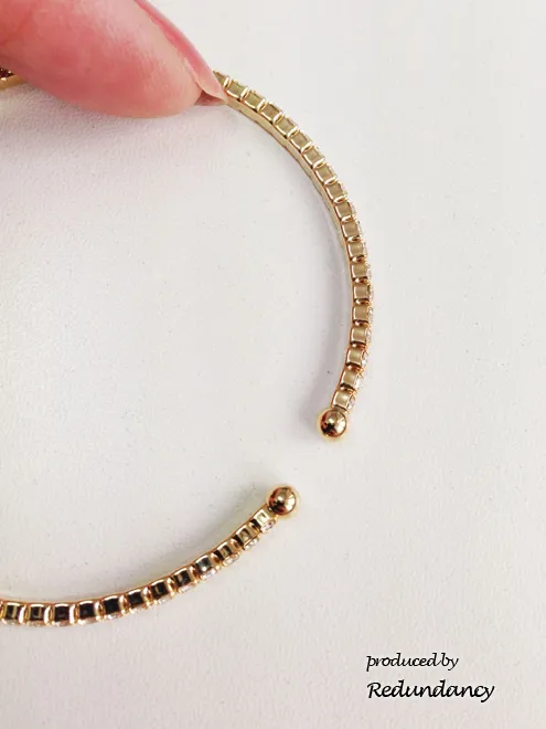 ゴールドのパールとビジュー付バングル