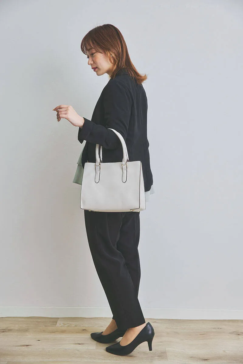 ライトグリーン×ブラックのペプラムトップスパンツドレス