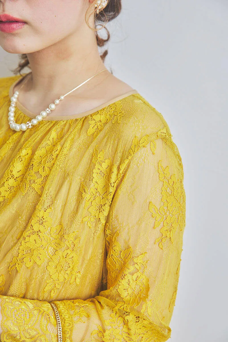 イエローのティアードレースドレス