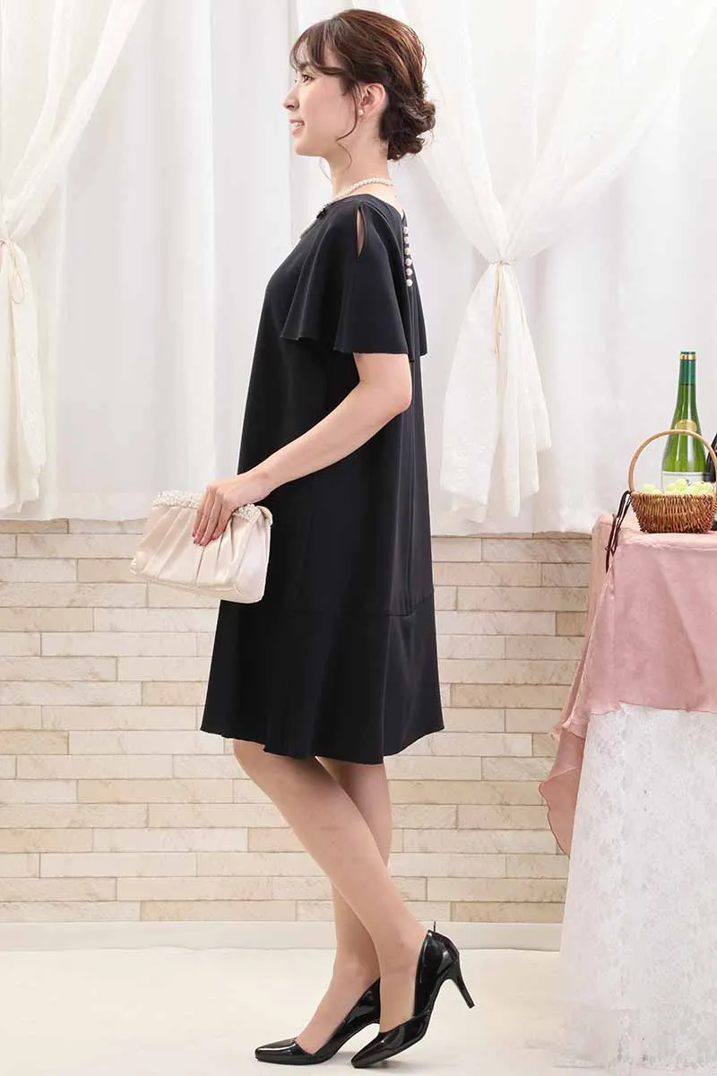 ネイビーのスリット入りフリルスリーブドレス