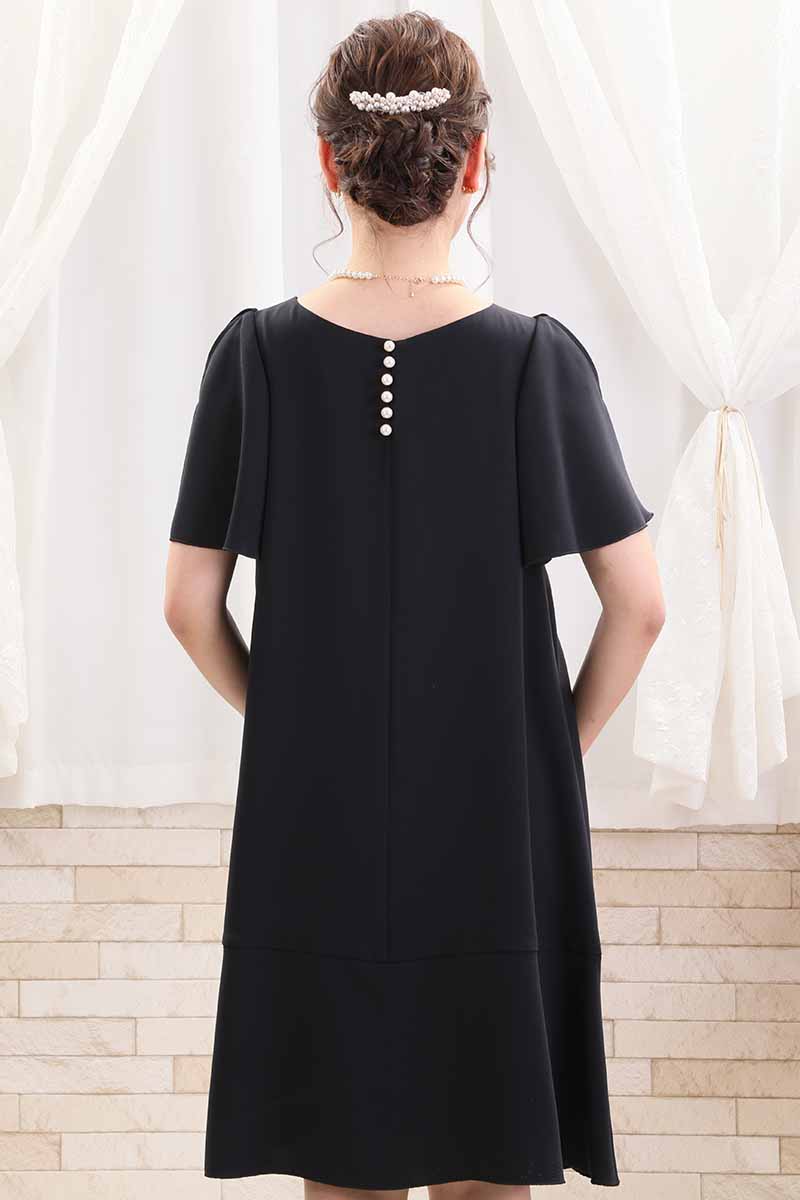 ネイビーのスリット入りフリルスリーブドレス