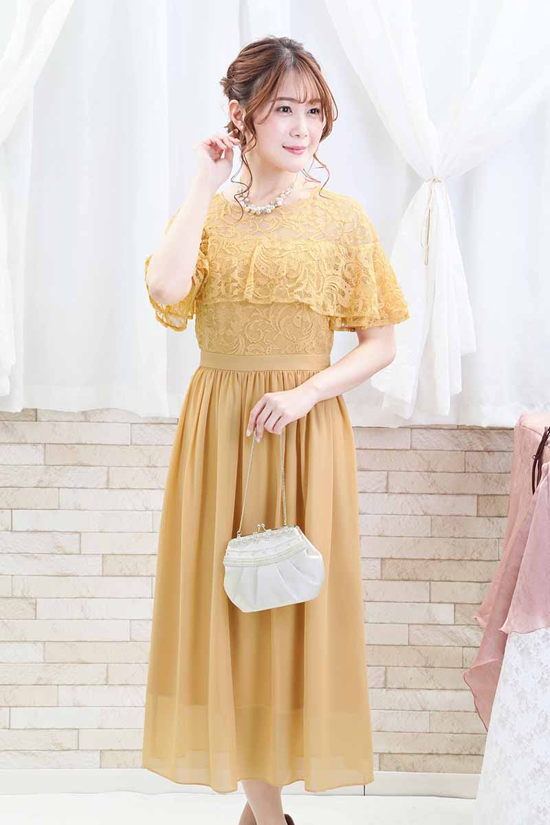 イエローのケープ風フリルドレス