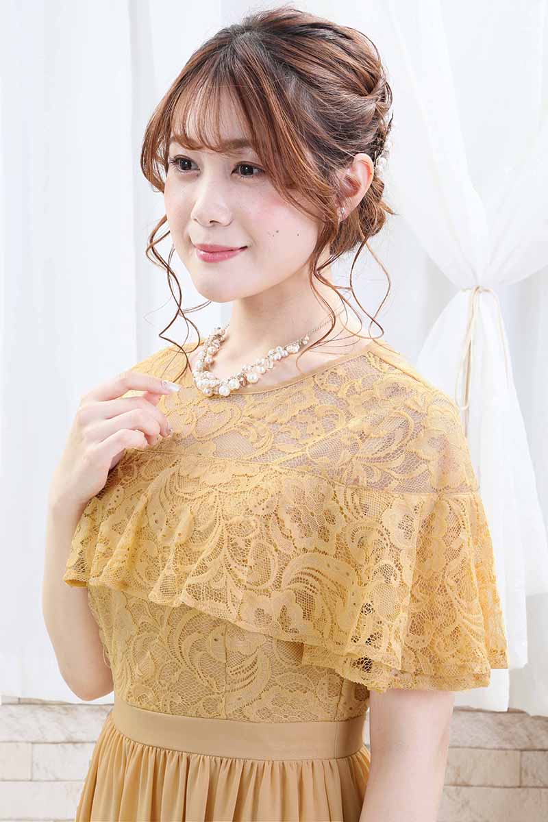 イエローのケープ風フリルドレス