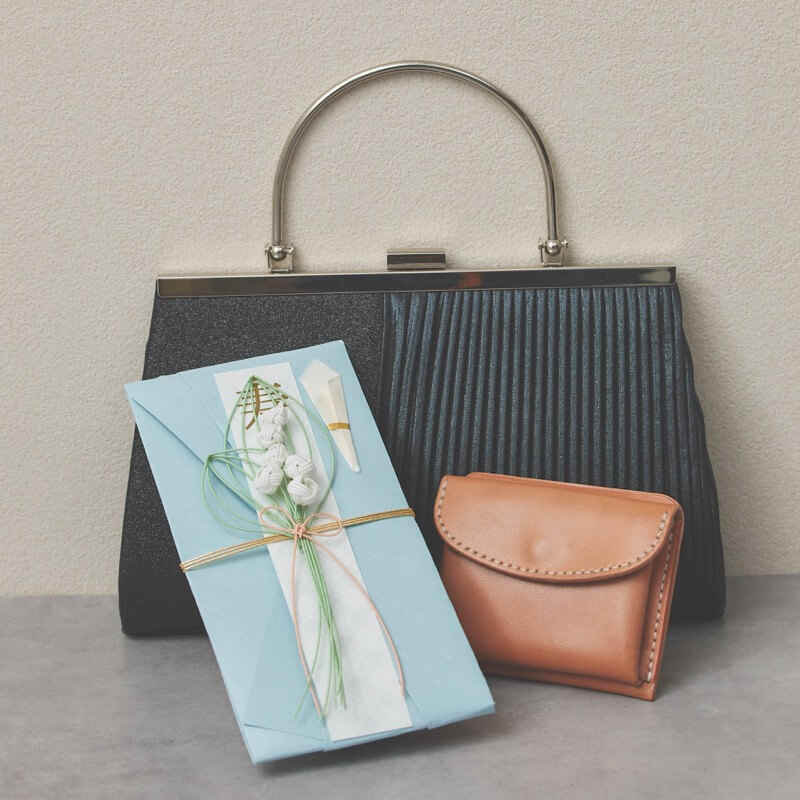 ブラックのグリッタープリーツバッグ