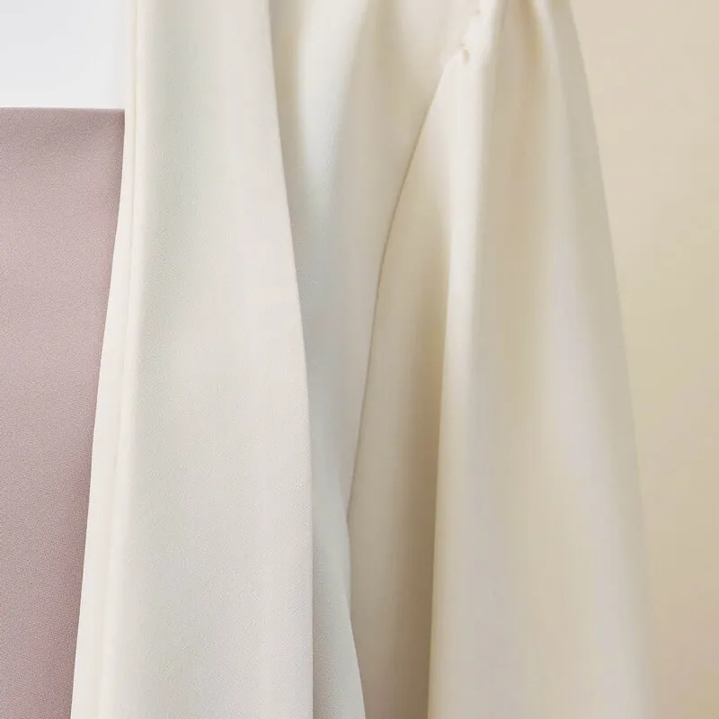 アイボリーのショールカラージャケット