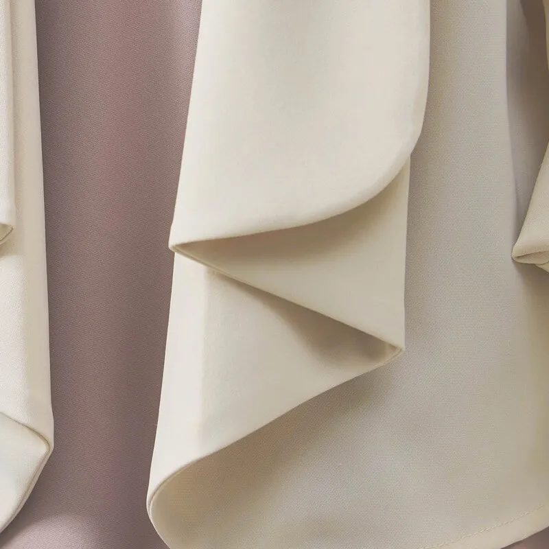 アイボリーのショールカラージャケット