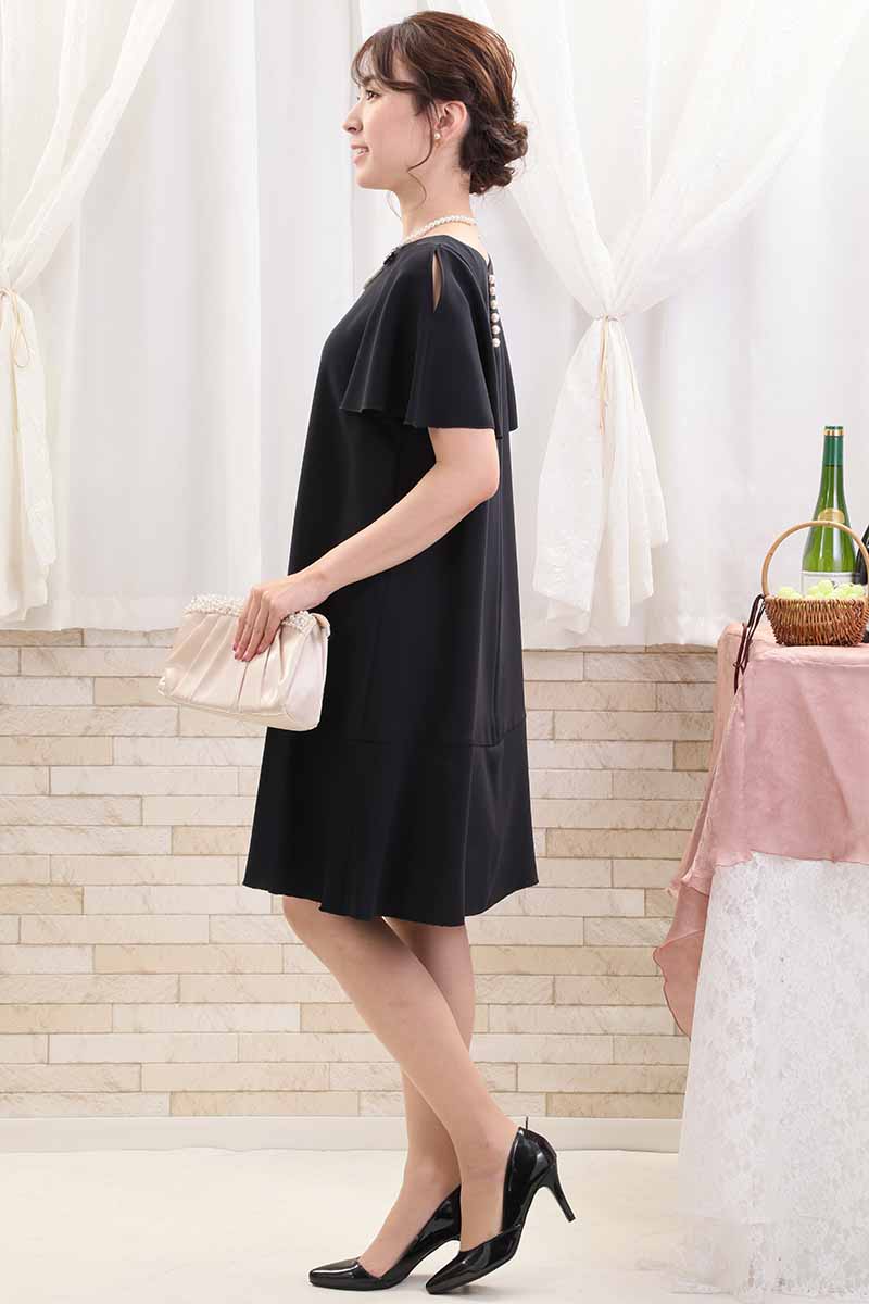 ネイビーのスリット入りフリルスリーブドレス