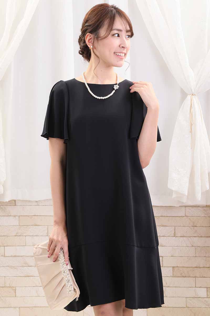 ネイビーのスリット入りフリルスリーブドレス