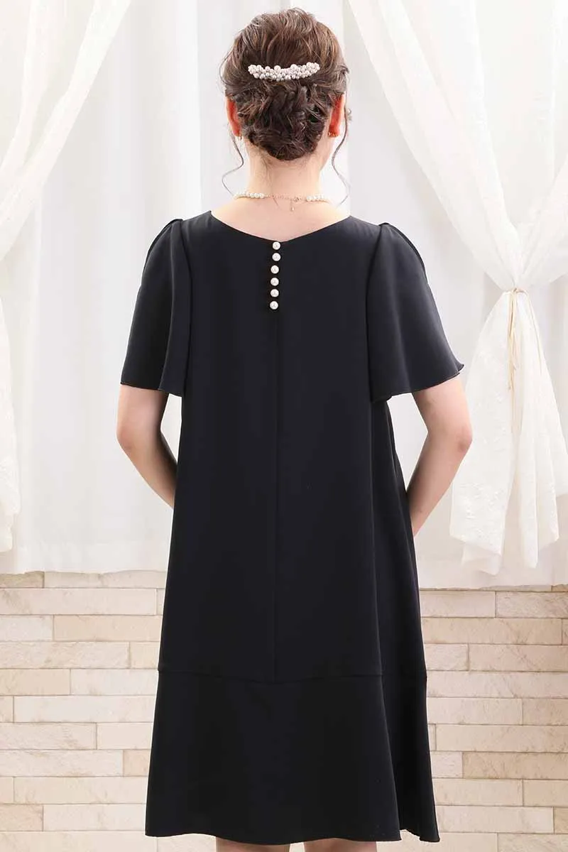 ネイビーのスリット入りフリルスリーブドレス