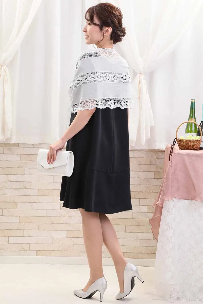 ネイビーのスリット入りフリルスリーブドレス