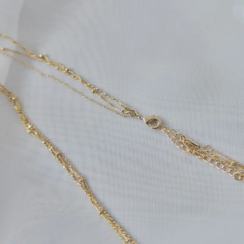 ゴールドの一粒パールの3連チェーンネックレス