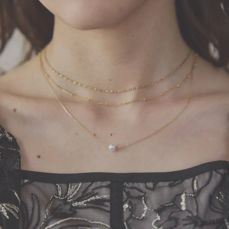 ゴールドの一粒パールの3連チェーンネックレス