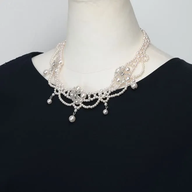 ホワイトパールの花モチーフネックレス