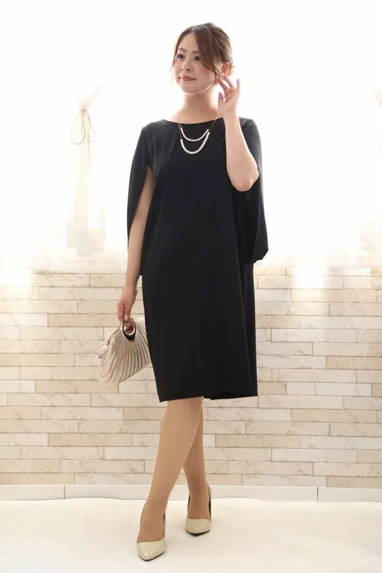 ネイビーのケープスリーブドレス